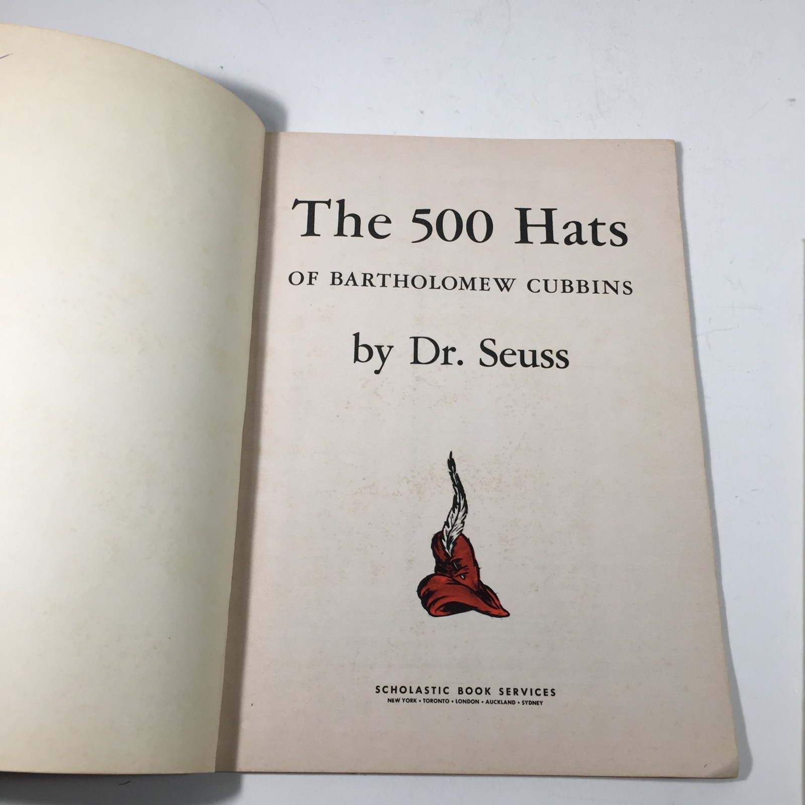 Lot of 4 Paperback Childrens Books-Dr. Seuss 500 Hats, Smurfs, Fox & Hound, Oz